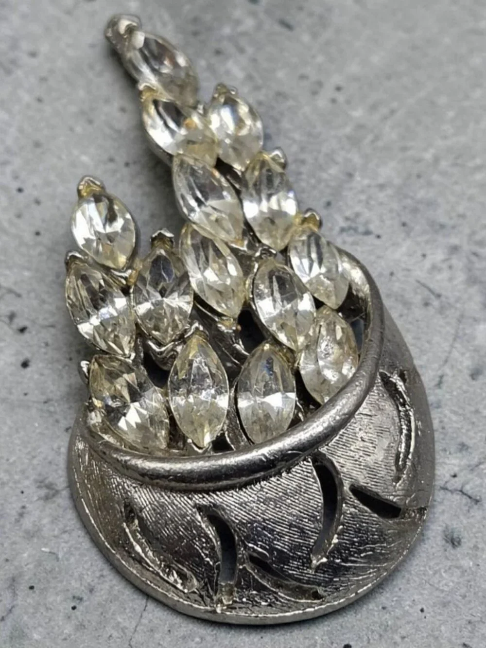 None this brooch